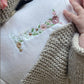 FLORAL INITIAL INFANT ONE PIECE